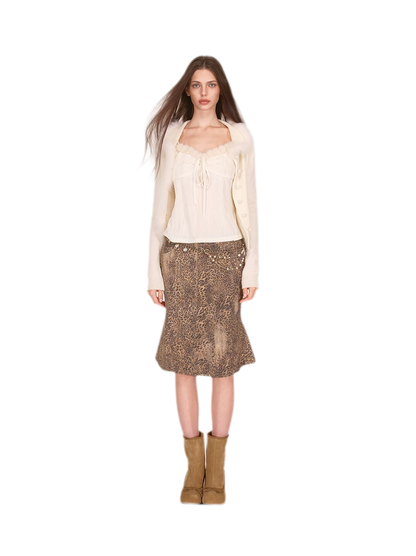 Gilet court en maille avec bordure en fourrure de renard