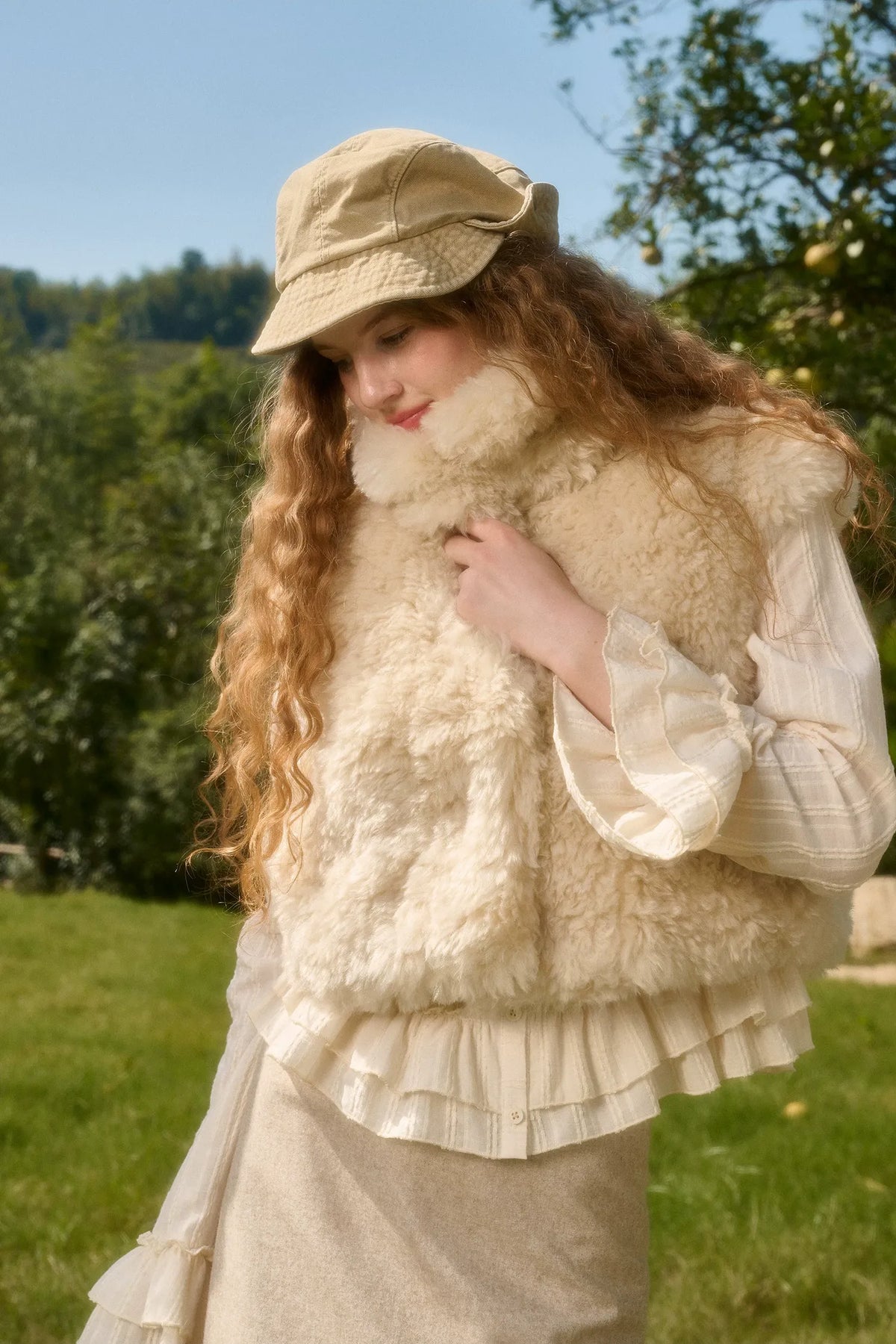 Gilet corto in ecopelliccia — Carica immagine 9 in vista galleria