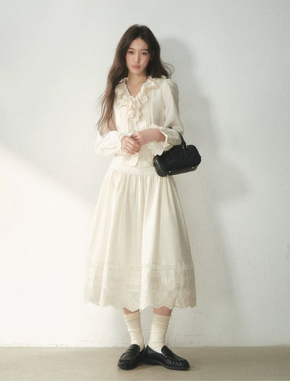 Conjunto de camisa y falda de lana con volantes