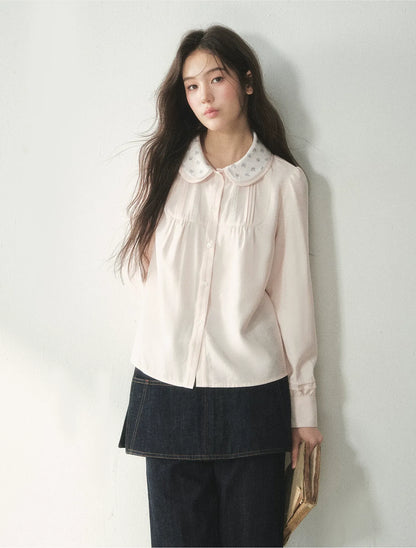 Blusa de lyocell con cuello de encaje