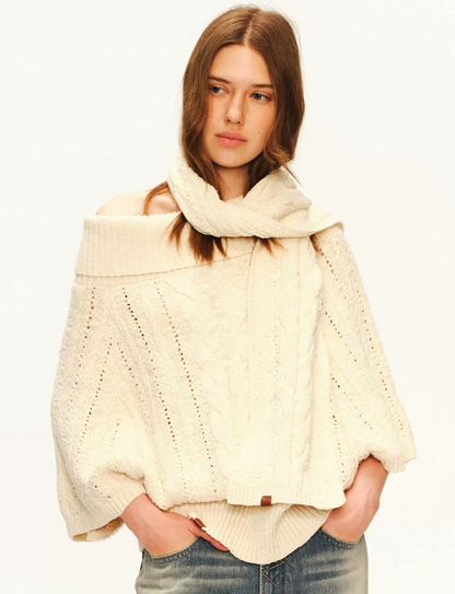 Pull asymétrique en maille torsadée