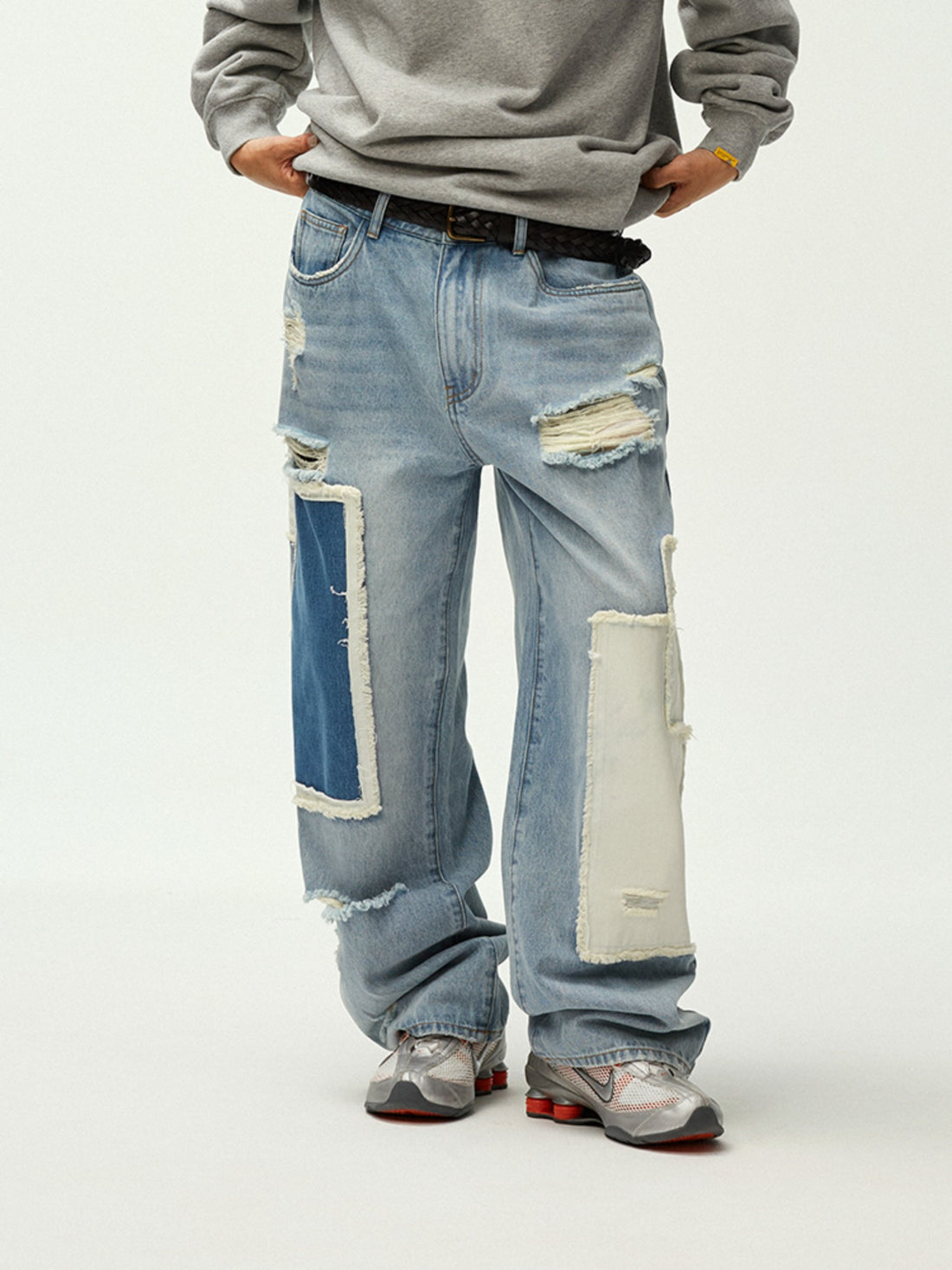 Asymmetric Patchwork Distressed Straight-Leg Jeans