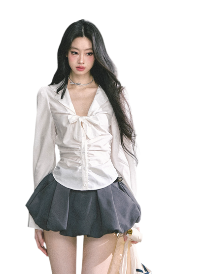 Camisa corta con pajarita