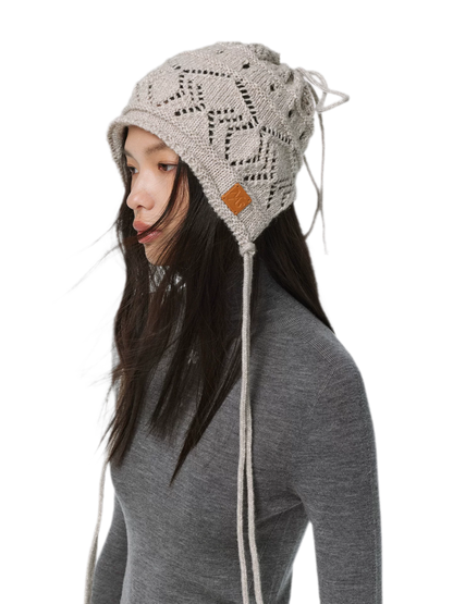 Gorro de punto grueso calado a rayas