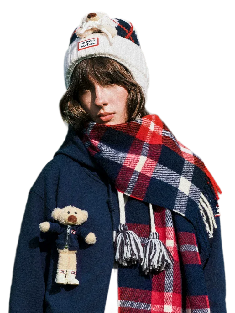 Cappello in maglia con paraorecchie e motivo a rombi