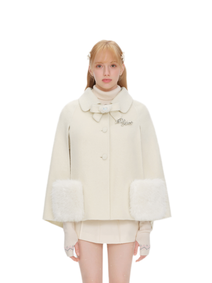 Cappotto mantella in peluche con fiocco