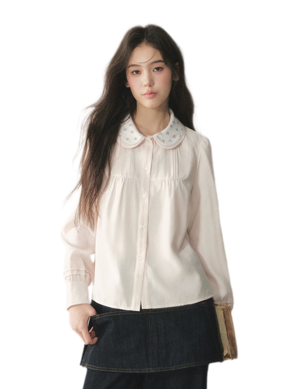 Blusa de lyocell con cuello de encaje
