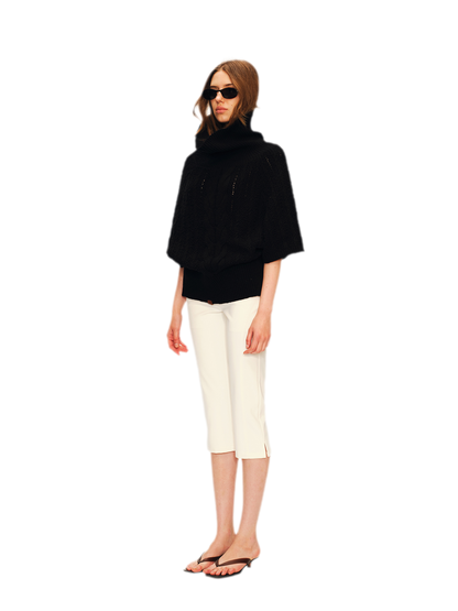 Pull asymétrique en maille torsadée