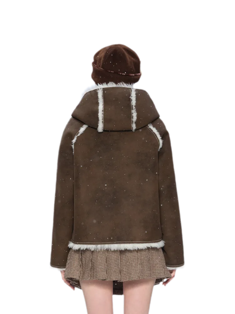 Veste courte réversible en fausse fourrure