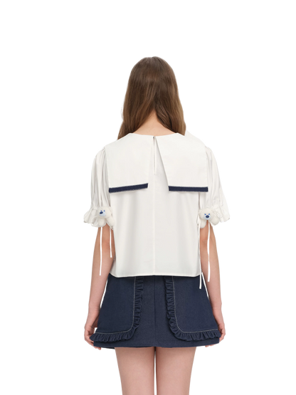 Short-sleeve shirt with 3D bow