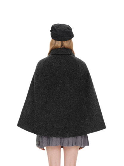 Cappotto mantella in peluche con fiocco