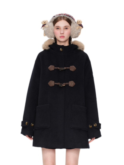Manteau en laine texturée à boutons brandebourg