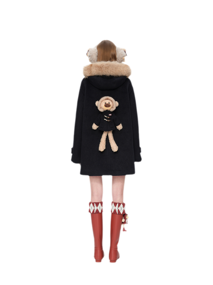 Manteau en laine texturée à boutons brandebourg
