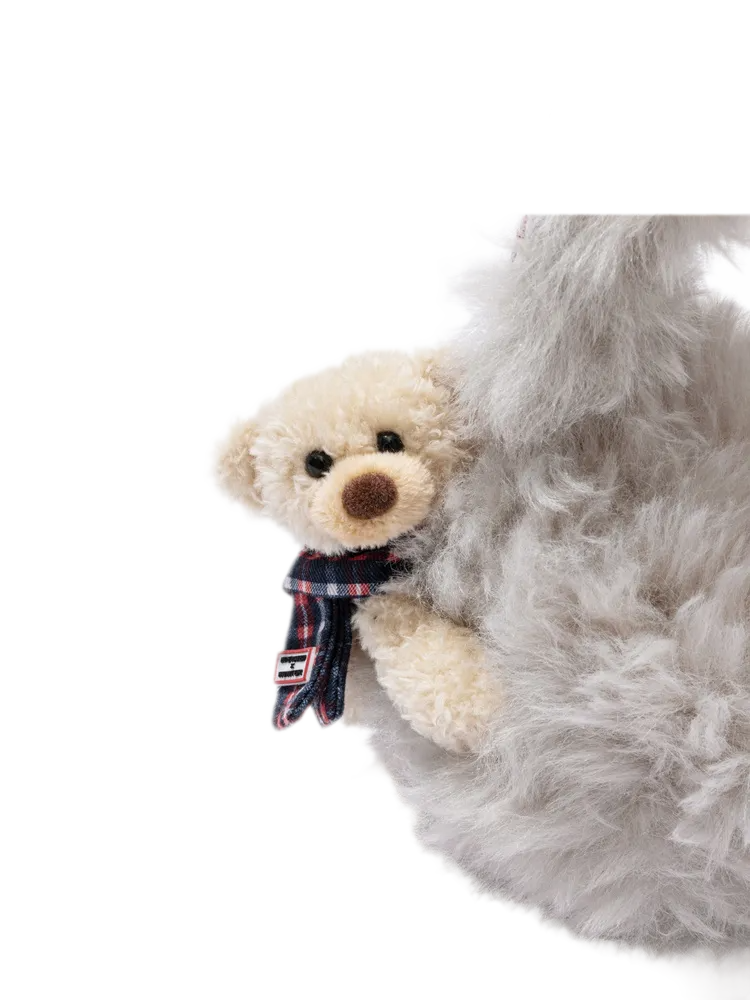 Paraorecchie in peluche a forma di orso con fiocco