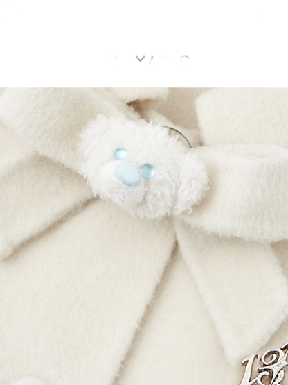 Cappotto mantella in peluche con fiocco