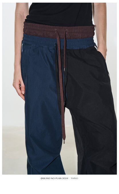 Pleated Wide-Leg Track Pants