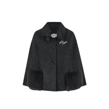 Cappotto mantella in peluche con fiocco
