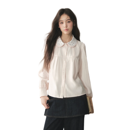 Blusa de lyocell con cuello de encaje