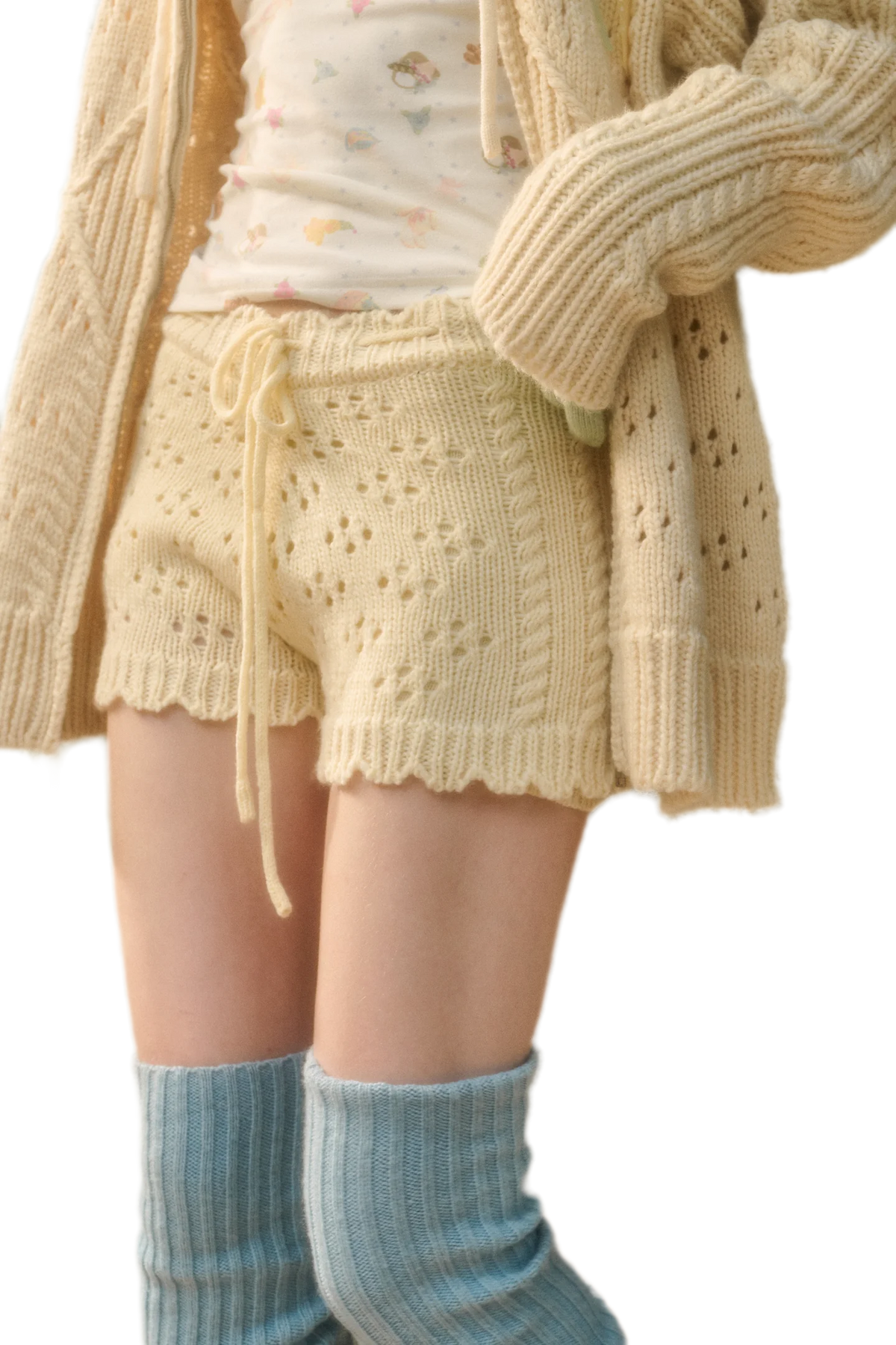 Completo con cappuccio in maglia a trecce