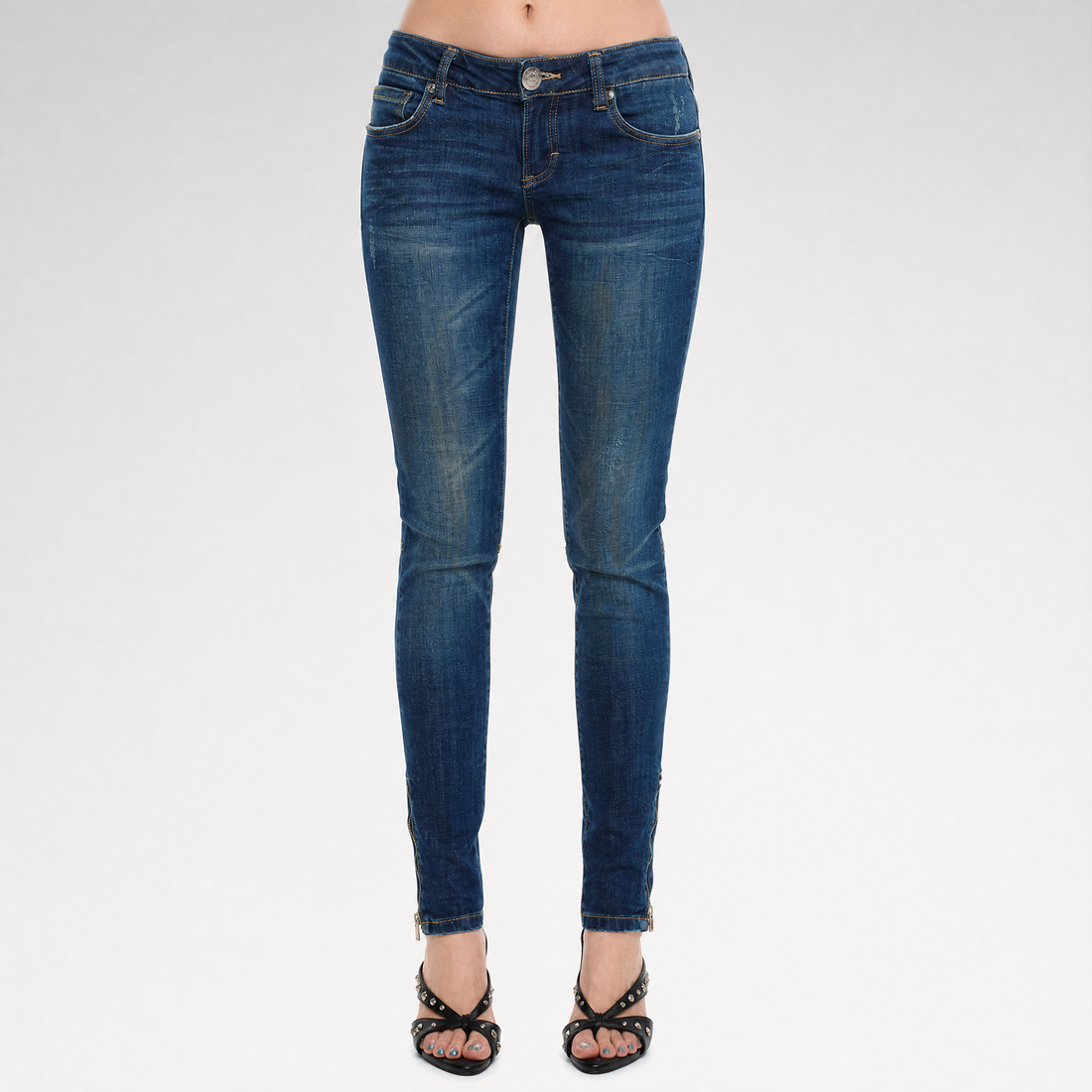 Distressed Low-Rise Slim Jeans